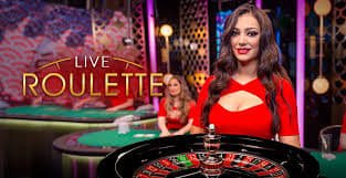 Antarmuka pemain studiobet menunjukkan riwayat permainan Caribbean Stud Poker, saldo akun, dan opsi penarikan dana